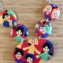 Vintage Tin Necklace -Smiles Around the World